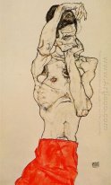 standing male nude with a red loincloth 1914