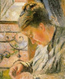 portrait of madame pissarro sewing near a window