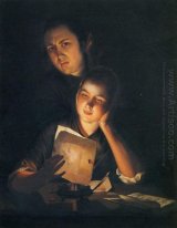 Une fille lisant une lettre par Candlelight avec un jeune homme