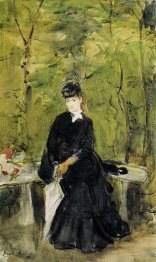 Young Lady Seated On A Bench