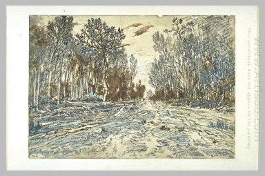 Snowy-Weg durch einen Wald im Wald von Fontainebleau