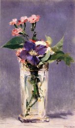 pinks and clematis in a crystal vase