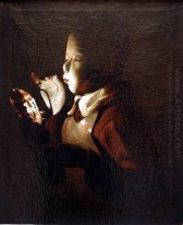 Boy Blowing At Lamp