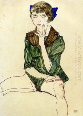 sentada mulher em uma blusa verde 1913