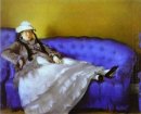 Madame Manet auf einem blauen Sofa 1874