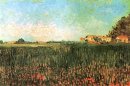 Bauernhäusern auf einem Weizenfeld in der Nähe von Arles 1888