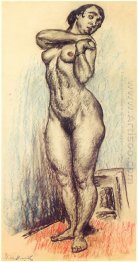 Nude standing and resting her hands on her left shoulder