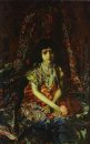 Stående av en flicka mot en persisk matta 1886