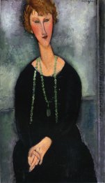 woman with a green necklace madame menier 1918