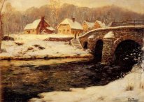 A Stone Bridge Over a Stream in Winter