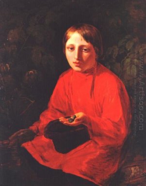 En pojke i en röd skjorta