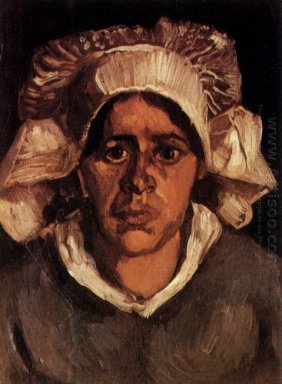 Tête d\'une femme rurale avec le chapeau blanc 1885 2