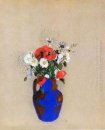 Coquelicots et de marguerites dans un vase bleu