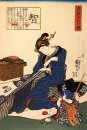 Une femme assise à coudre un kimono