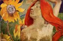 Redheaded vrouw en zonnebloemen