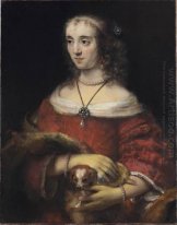 Portret van Een Vrouw met Een hondje 1662