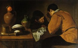 Two Young Men Eating At A Humble Table