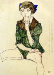 sitting woman in a green blouse 1913