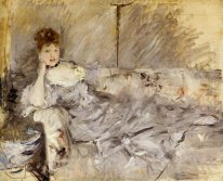 Young Woman In Grey Reclining