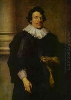 portrait of a gentleman dressed in black in front of a pillar