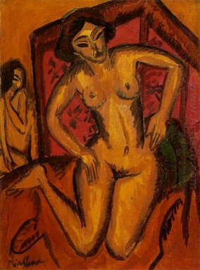 Femme nue agenouillée devant un écran rouge